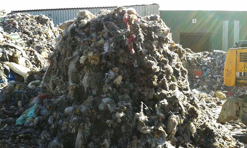 Shredding and recycling mattresses into refuse-derived fuel (RDF)